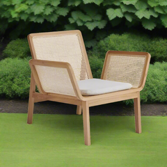 Natural Rattan Wicker Chairs, Solid teak, Suitable for Outdoor Use, in a garden.