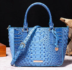 Women’s crocodile print handbag with zipper closure