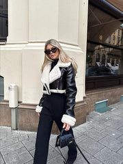 A black double-sided fleece short jacket on a woman. Warm, Thick Lapel Lambswool Coat.