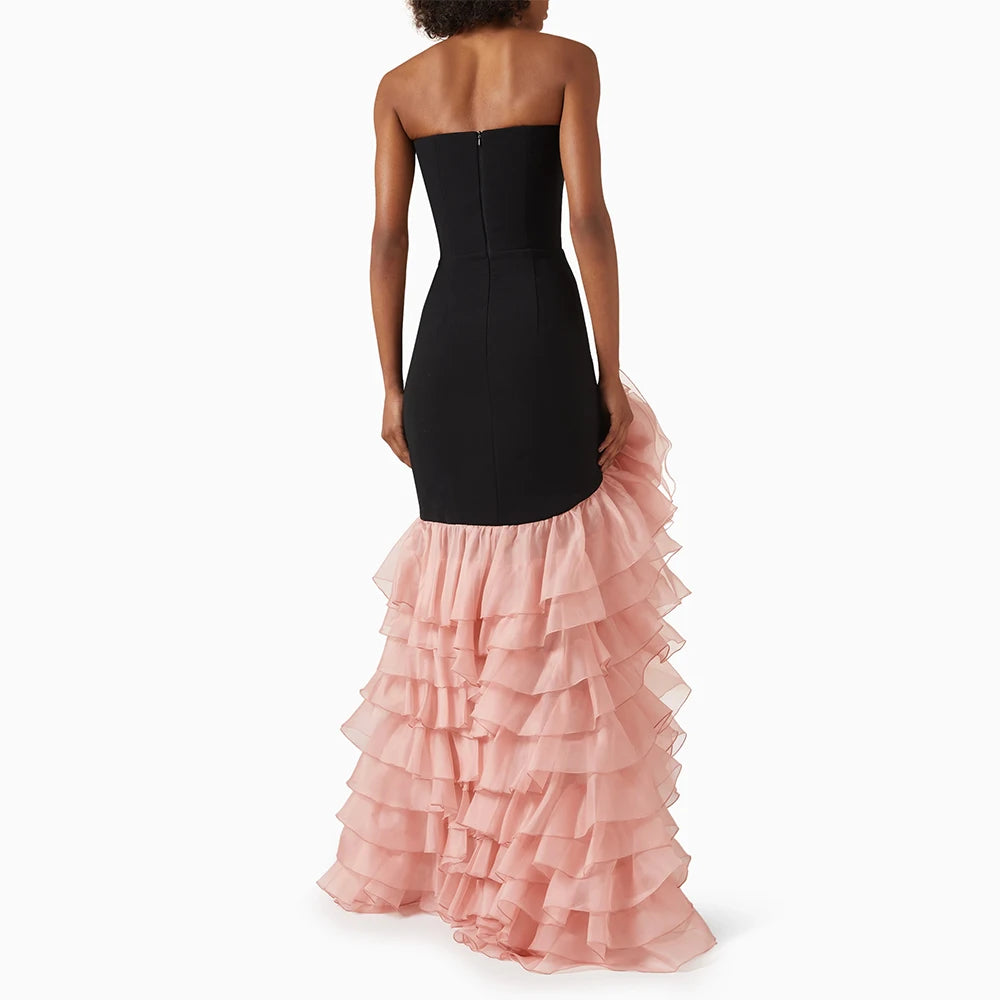 Fit-and-flare evening gown with dramatic ruffle cascade at the skirt