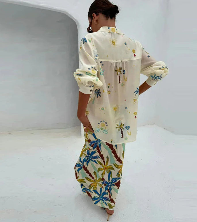 Back view of tropical print co-ord with long sleeves and shorts