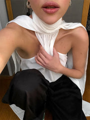 Elegant women’s white blouse with lace-up neckline