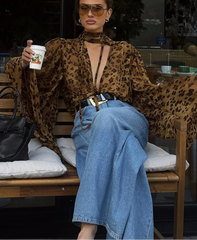 V-neck leopard lace shirt shown as a bold day-to-evening look