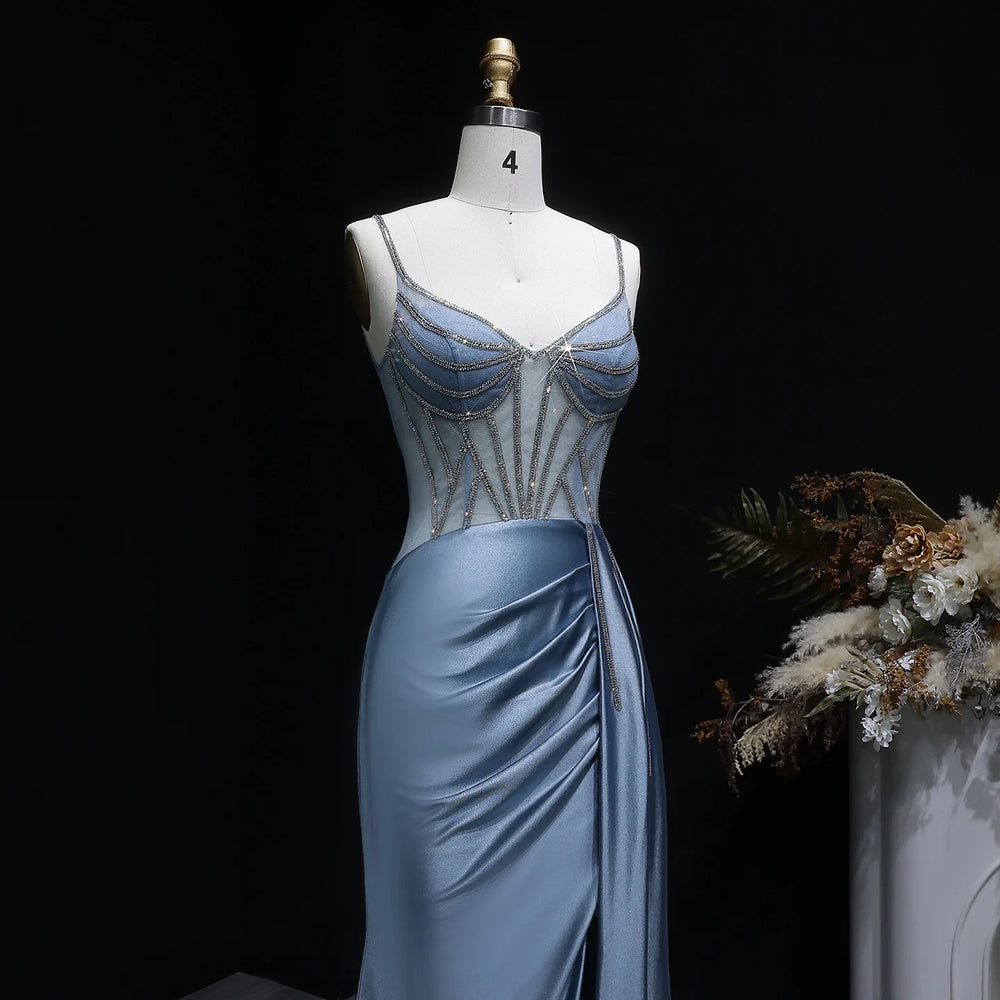 Satin gown with V-neckline, beading detail, and sculpted side draping