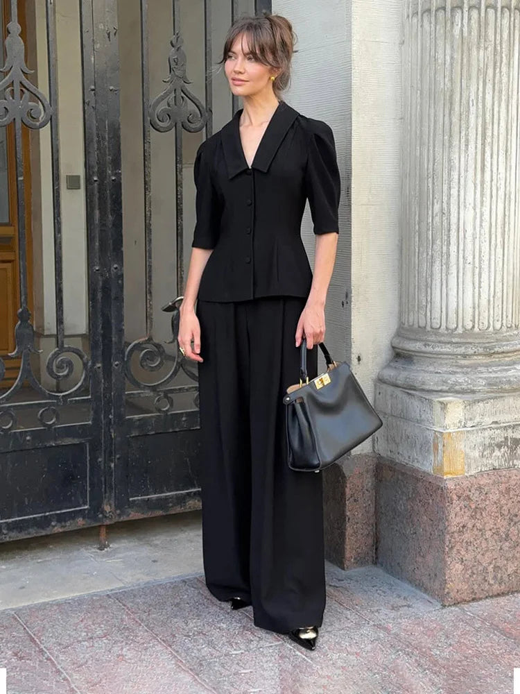 Two-piece outfit with V-neck button-front shirt and ankle-length trousers