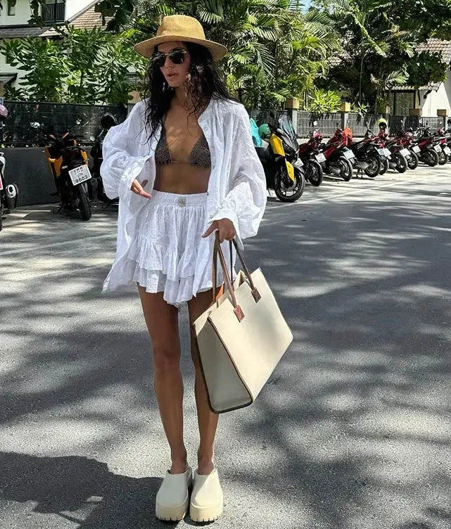 Vacation shirt and shorts resort outfit captured for casual holiday edits