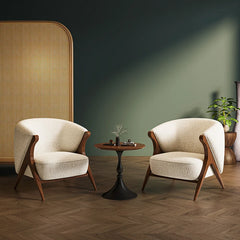 “Modern velvet lounge chair with side table in reading corner”

