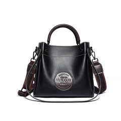 Multi-compartment soft leather crossbody tote in black