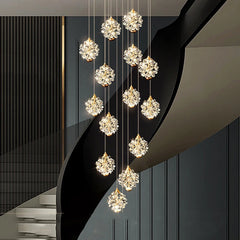 Vertical crystal ball staircase chandelier in a luxury stairwell