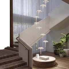Vertical crystal LED halo chandelier suspended in a duplex
