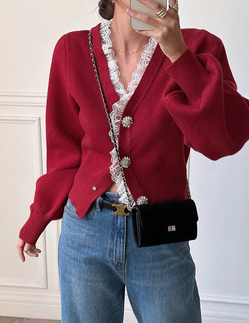 Cardigan layered over camisole showing slim silhouette and soft drape.