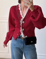 Cardigan layered over camisole showing slim silhouette and soft drape.