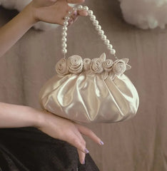 Vintage pearl handle handbag with floral appliqué design