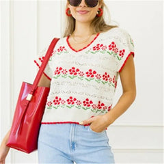 A full-length shot of a vintage sleeveless jumper styled for a casual day out.