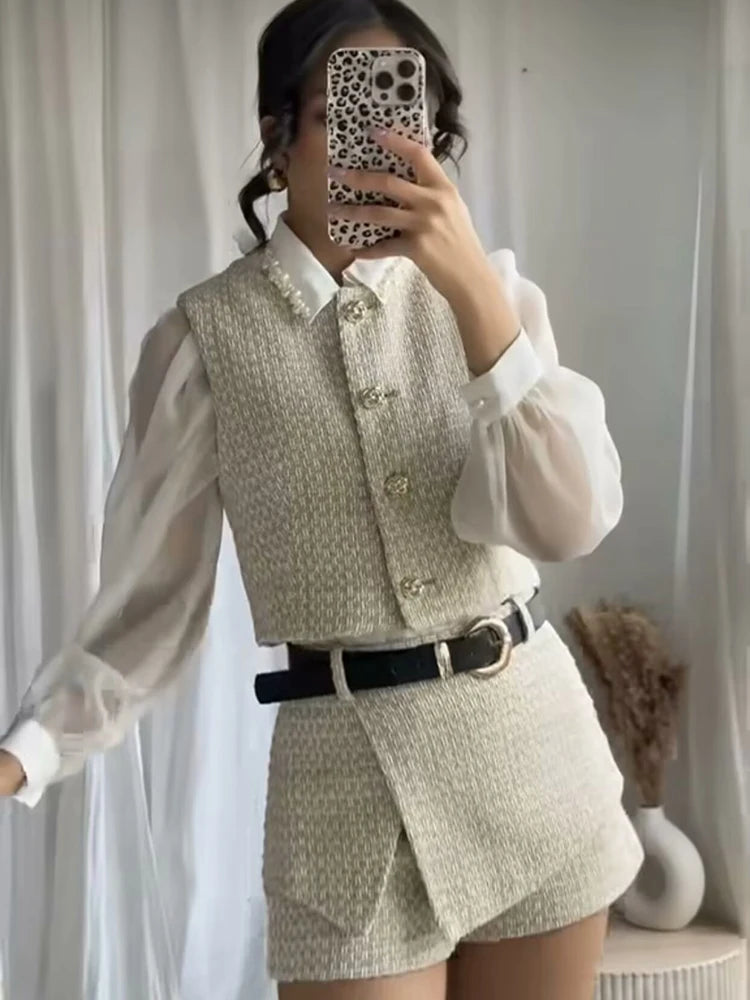 Vintage tailored vest and shorts set styled for chic neutral looks