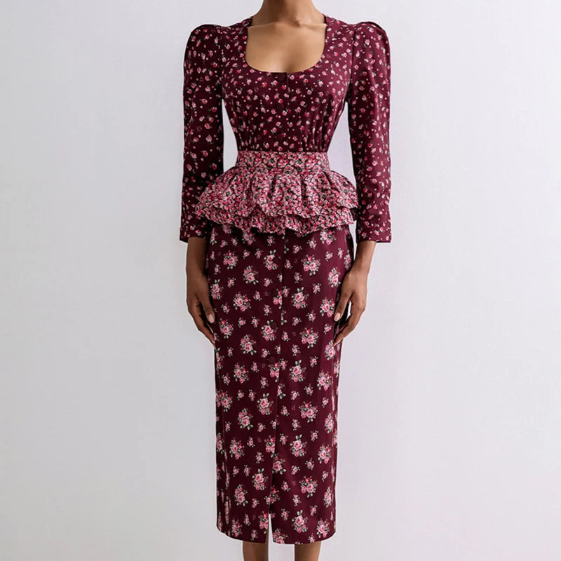 Ruffle waist detail on printed peplum dress with elegant floral patterns