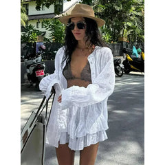 White eyelet shirt and short set styled for breezy boho summer looks