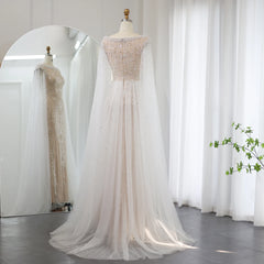 Floor-length white mermaid dress with built-in bra and detailing- back view