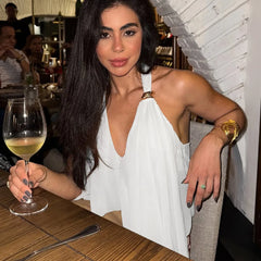 Full look captures the flowing hem movement and relaxed silhouette, creating an elevated summer outfit for city afternoons and dinners.