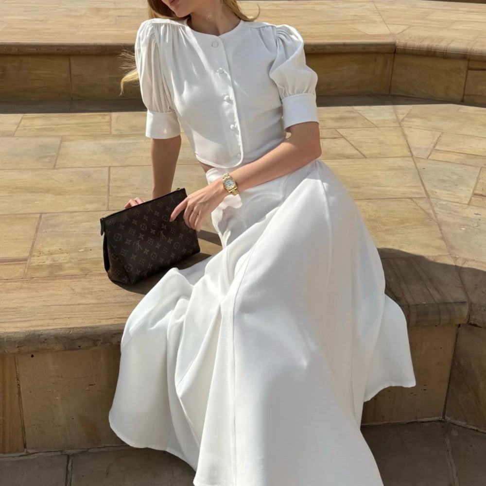White long skirt and top styled for celebrations and evening wear