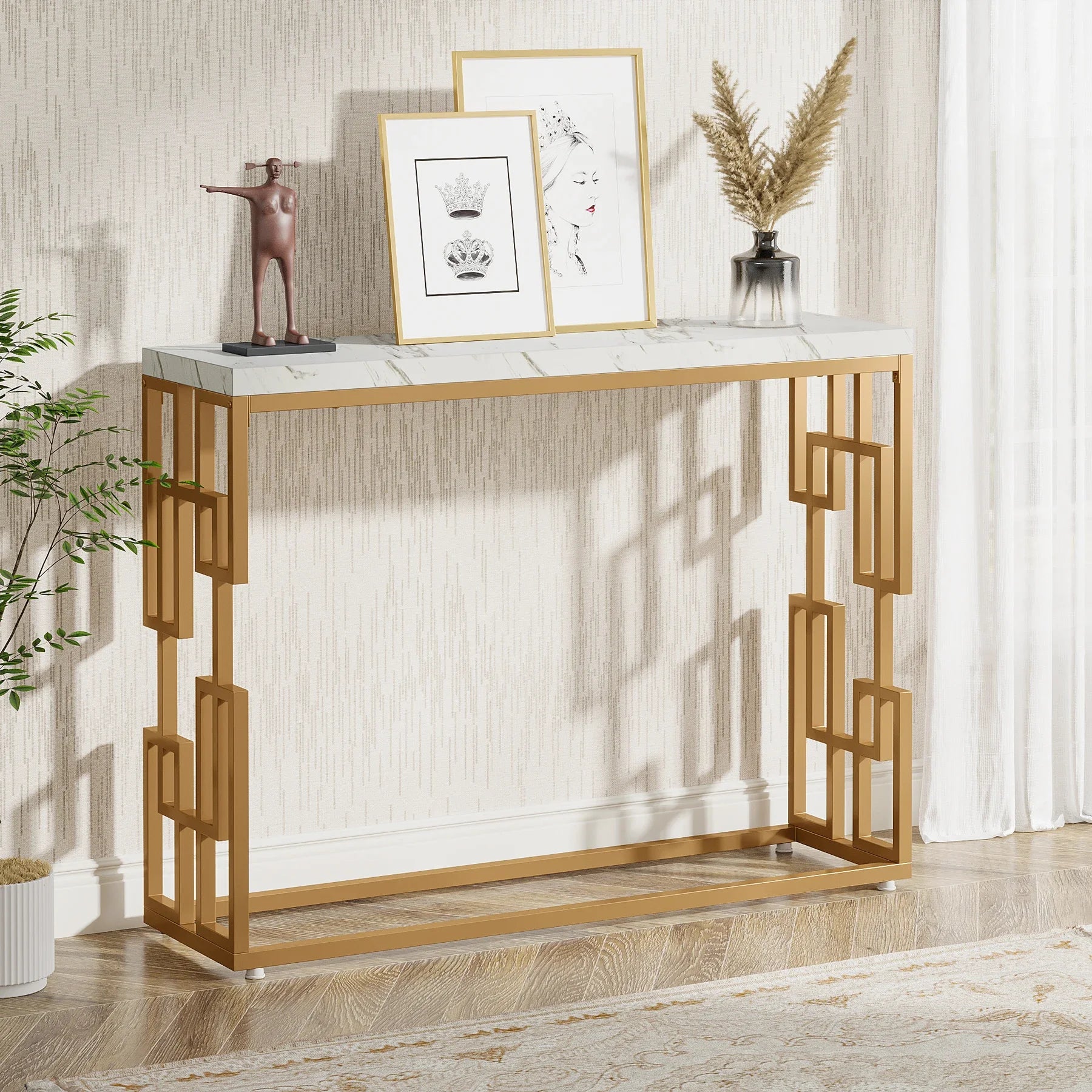 “White faux marble console table with gold metal frame for entryways”

