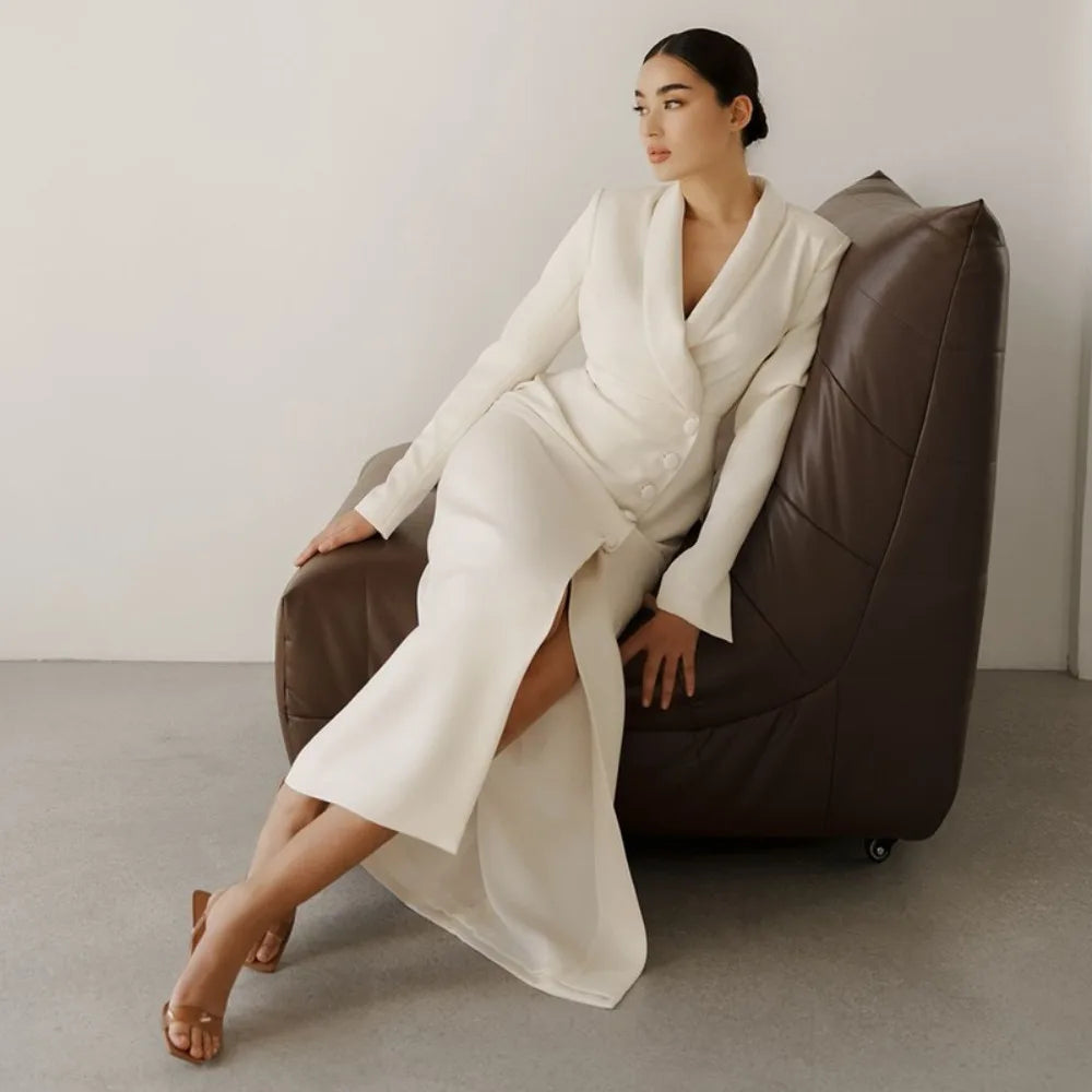 White notched collar maxi coat dress styled for minimal city elegance