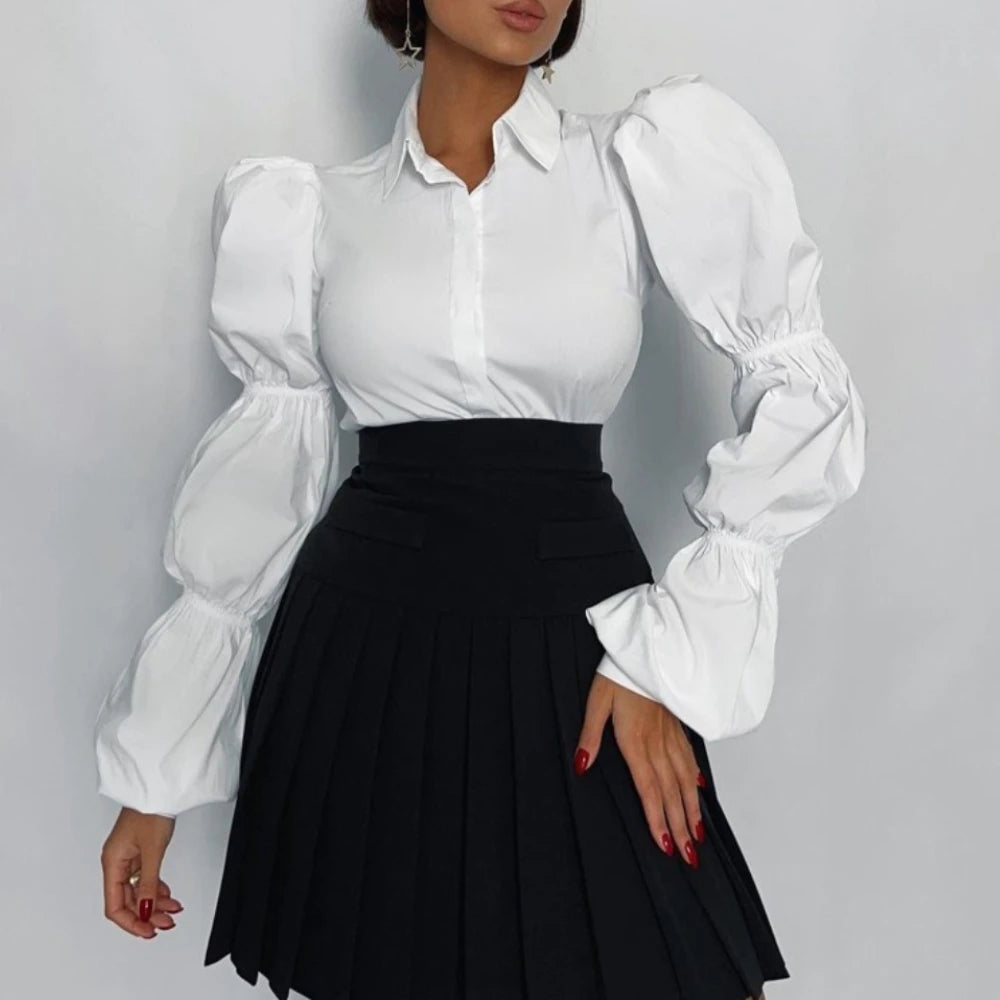 White puff sleeve blouse for women styled with black skirt