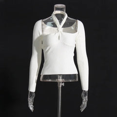 Close-up highlights the ribbed texture and keyhole cutout placement, creating a refined neckline detail that feels minimal and intentional.