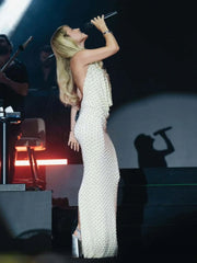 Full-length view of the slim sheath silhouette falling to the ankles, styled with minimal accessories for a refined formal-night outfit.