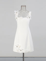 Elegant white mini dress with 3D floral embellishments