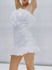 White strapless mini dress with sculptural shell folds