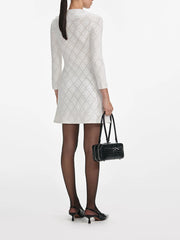 High waist mini dress with long sleeves and clean structured finish