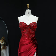 Lace-up back and sweep train detail on satin mermaid prom gown