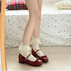 Wine red Mary Jane pumps with butterfly-knot strap