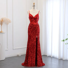 Sweetheart sequin mermaid prom gown with front slit on mannequin