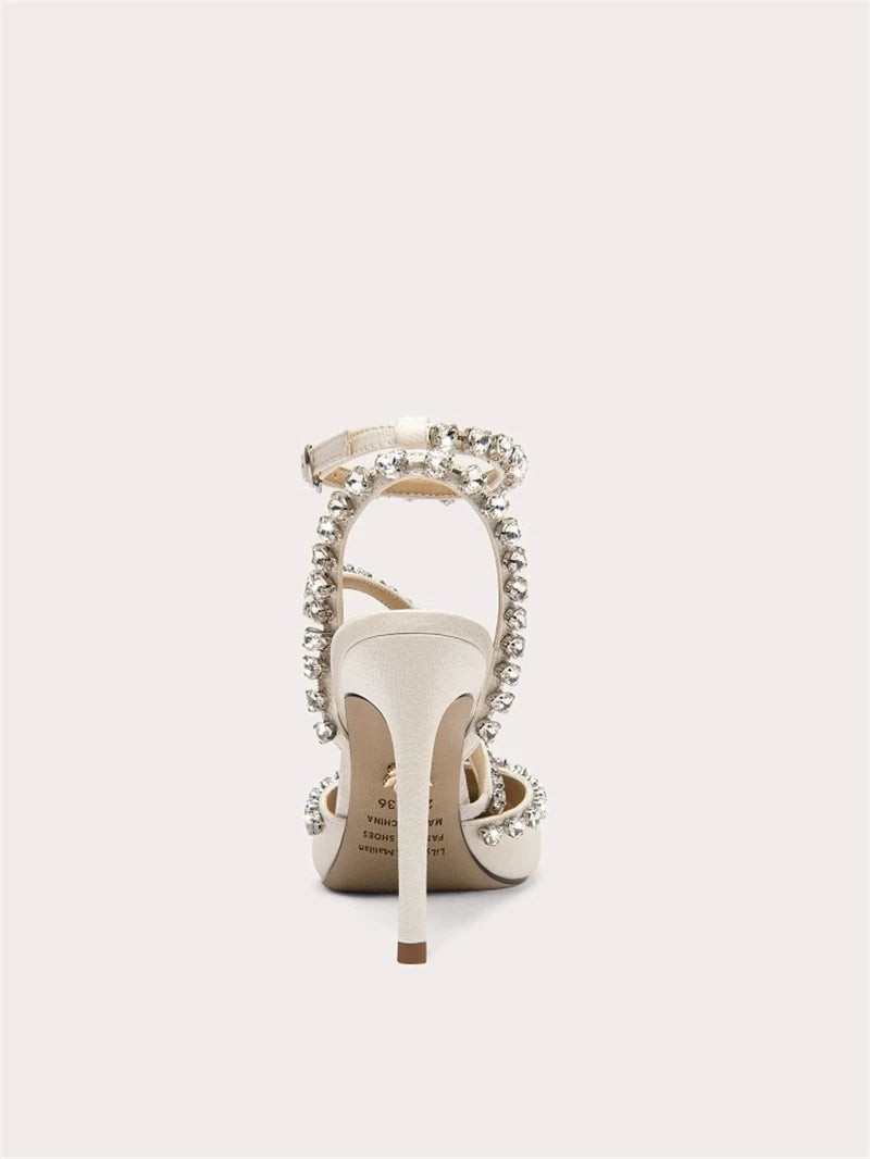 Close-up of silk and rhinestone bridal sandals