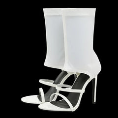 White slip-on high heel boots with stretch fabric