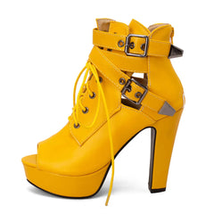 Women’s bold buckle platform ankle boots in yellow