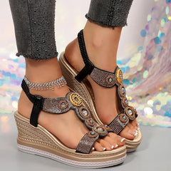 Side angle of ankle strap wedge sandals with metallic finish