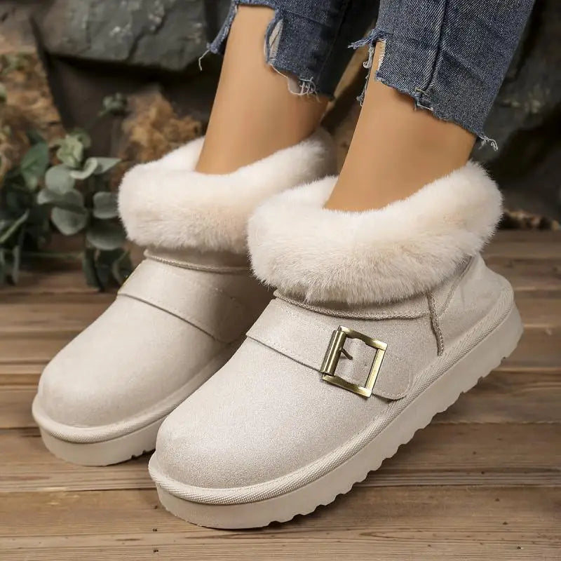 Women’s faux fur snow boots with metal buckle detail