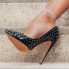 Black studded pointed toe pumps for party and evening wear