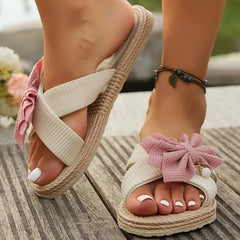 Side angle of linen strap vacation slides with bow detail
