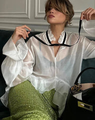 Loose fit woven blouse with ruffle neckline
