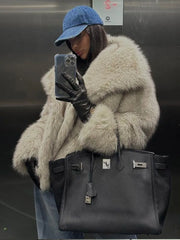 Elegant winter faux fur jacket with covered button closure