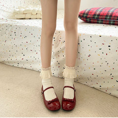 Women’s glossy PU Mary Jane pumps in red
