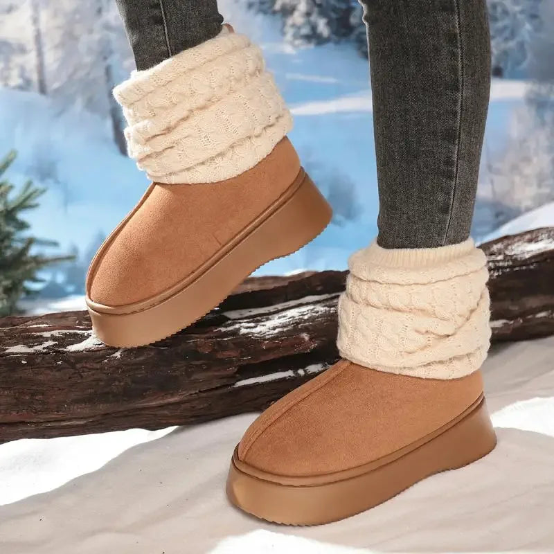 Close-up of suede snow boots with thick rubber sole