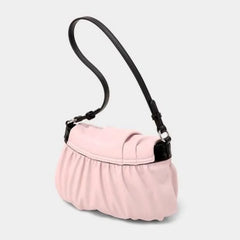 Y2K pink underarm bag for soft girl streetwear looks

