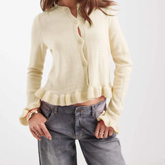 Yellow ruched knit cardigan styled with jeans for autumn

