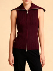 Front view highlighting the vertical zip closure and smooth ribbed texture of the knit