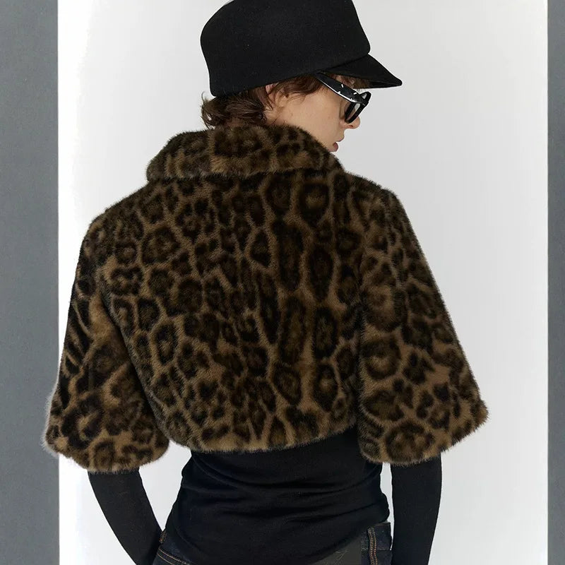 Close view of fluffy leopard pattern on a cropped zip jacket